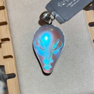 Alien Head Pendant carved in Luminite. Pricing is firm